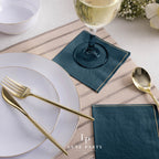 Dark teal napkins elegant table setting for dinner events from Parte Haus party supply store in Bethesda MD.