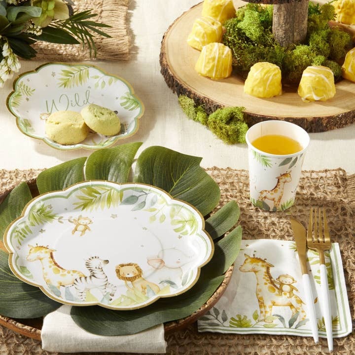 Green and white jungle animal themed plate cup and napkin set for kids birthday from Parte Haus party supply store in Bethesda MD