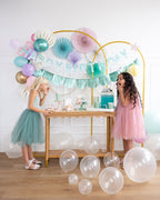 Pastel pink and teal birthday decorations with balloons for kids mermaid birthday from Parte Haus party supply store in Bethesda MD