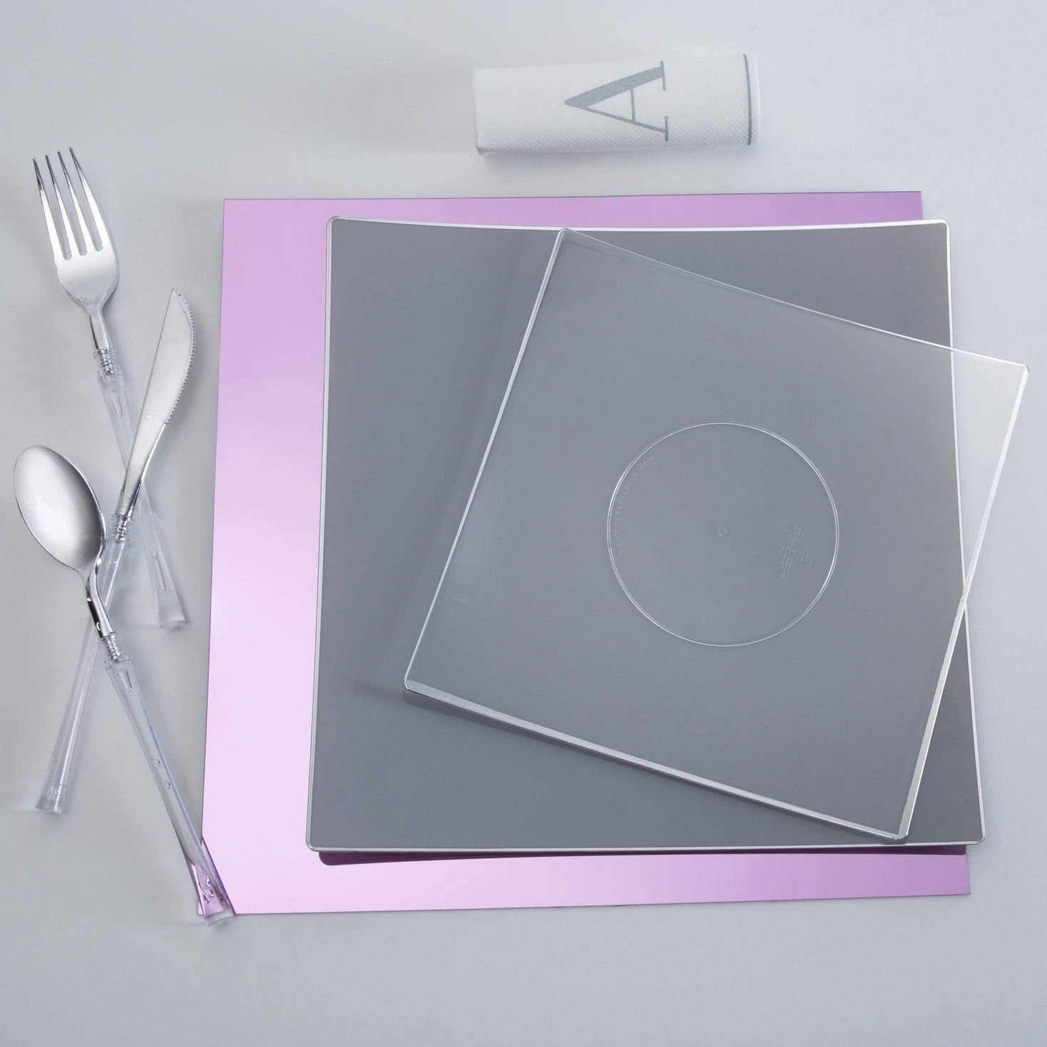 Silver and pink square dinnerware set with utensils for modern celebrations from Parte Haus party supply store in Bethesda MD