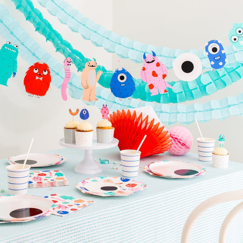 Multicolor monster birthday decorations kid theme tableware and garland from Parte Haus party supply store in Bethesda Maryland