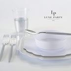White and silver disposable tableware elegant place setting for celebration from Parte Haus party supply store in Bethesda MD