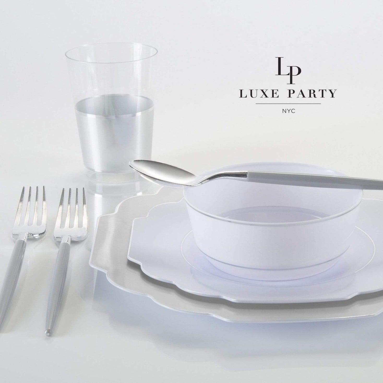 White and silver disposable tableware elegant place setting for celebration from Parte Haus party supply store in Bethesda MD