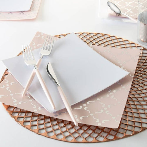 Blush pink and white square dinnerware with rose gold placemat for elegant event from Parte Haus party supply store in Bethesda Maryland