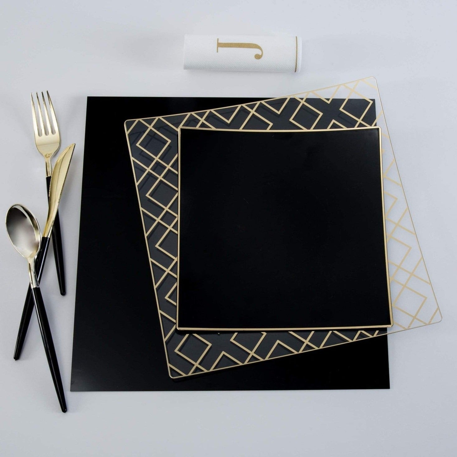 Black and gold geometric dinnerware set with flatware perfect for modern events from Parte Haus party supply store in Bethesda Maryland