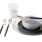 Gold and black modern dinnerware set with utensils for elegant event from Parte Haus party supply store in Bethesda MD