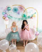 Pink and teal birthday decorations and pastel balloons mermaid birthday theme from Parte Haus party supply store in Bethesda MD