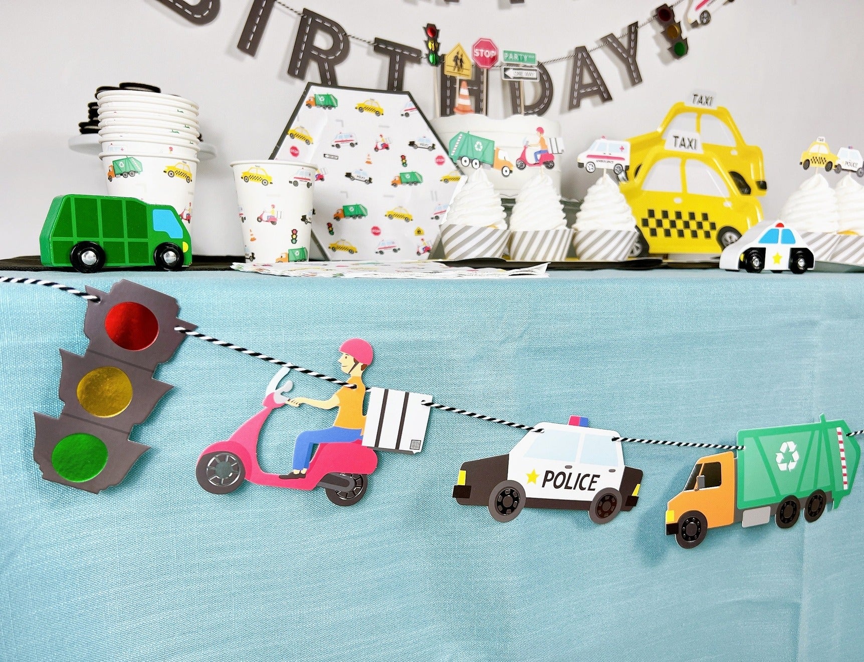 Colorful traffic and vehicle themed birthday table decor for kids from Parte Haus party supply store in Bethesda MD