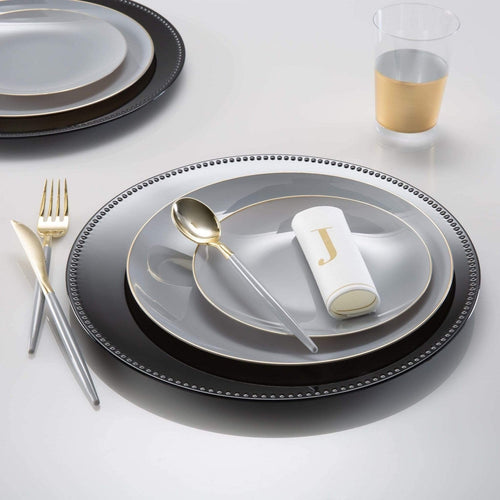 Gray and gold dinnerware set with gold cutlery elegant table setting for celebration from Parte Haus party supply store in Bethesda Maryland