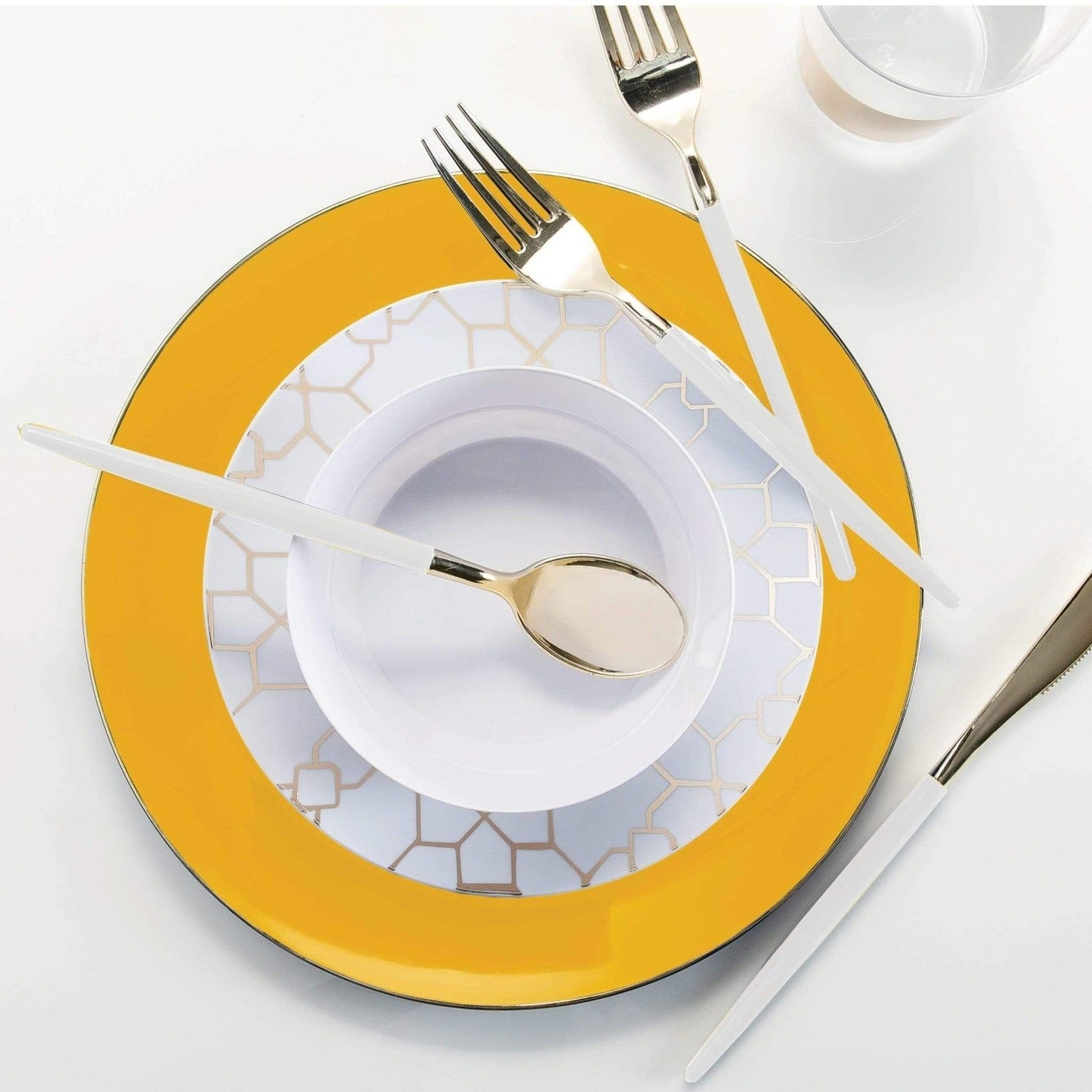 Yellow and white geometric disposable plates and cutlery elegant table setting from Parte Haus party supply store in Bethesda, MD