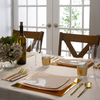 Gold and white dinnerware elegant table setting for celebration from Parte Haus party supply store in Bethesda MD