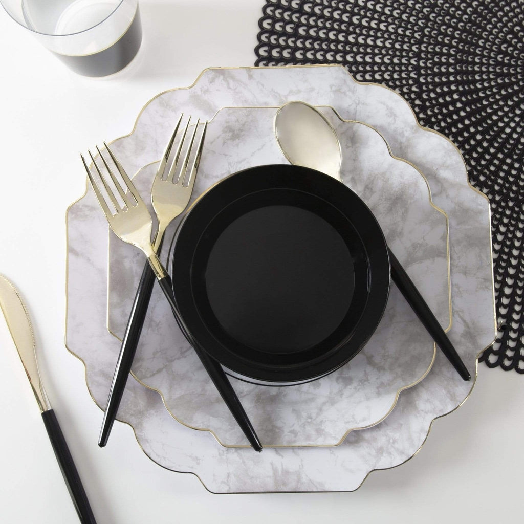 Black and marble grey tableware set with gold trim elegant table setting from Parte Haus party supply store in Bethesda Maryland