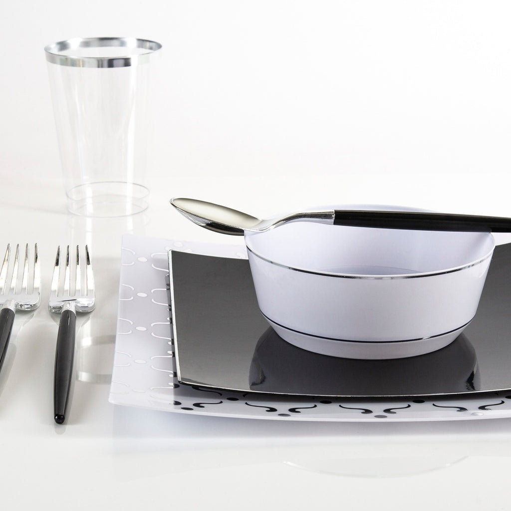Black and white upscale dinnerware set with forks bowl and spoon modern tableware for formal event from Parte Haus party supply store in Bethesda Maryland