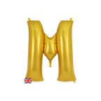 Gold letter M foil balloon birthday decoration from Parte Haus party supply store in Bethesda MD