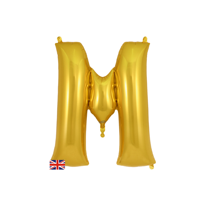 Gold 34in letter M foil balloon for birthday parties – from Parte Haus party supply store in Bethesda, Maryland.