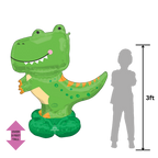 Green T rex foil balloon with cartoon face dinosaur birthday theme from Parte Haus party supply store in Bethesda Maryland
