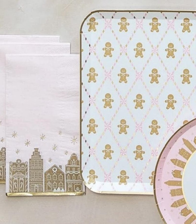 Pink and gold gingerbread plate and napkin set with holiday village design Christmas from Parte Haus party supply store in Bethesda MD