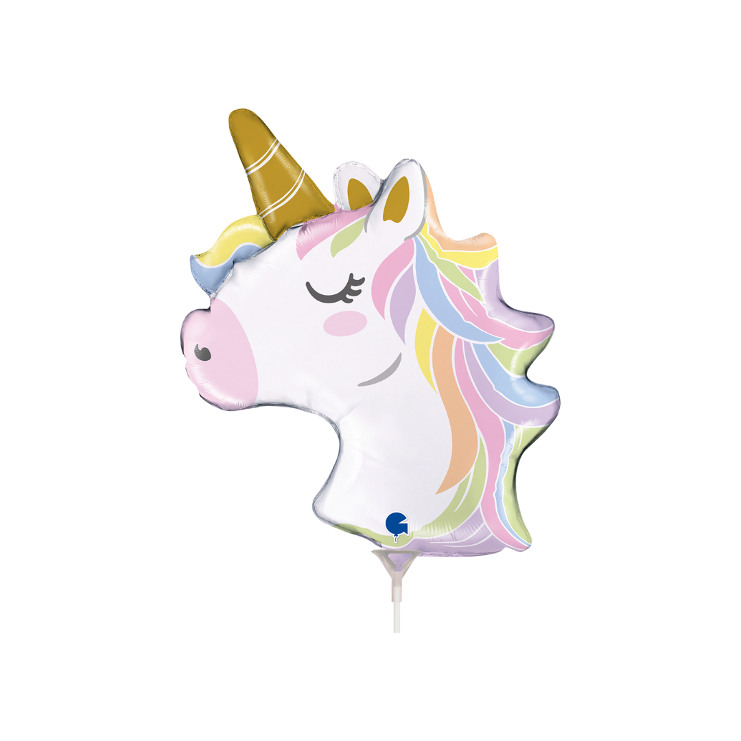 Pastel unicorn head foil balloon with rainbow mane for birthday from Parte Haus party supply store in Bethesda Maryland