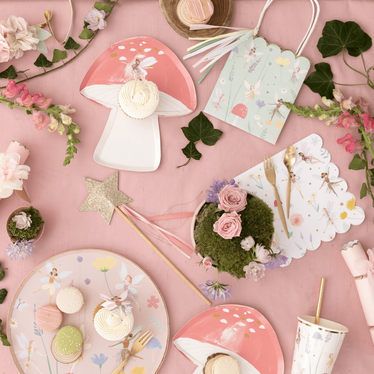 Pink fairy themed mushroom plates and floral decorations for birthday from Parte Haus party supply store in Bethesda MD