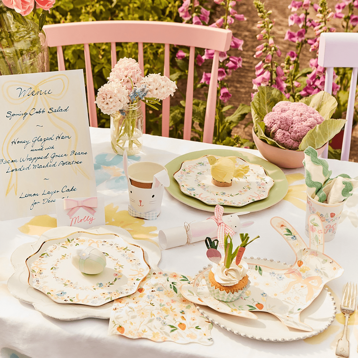 Pastel floral spring tableware Easter decorations on outdoor table from Parte Haus party supply store in Bethesda MD