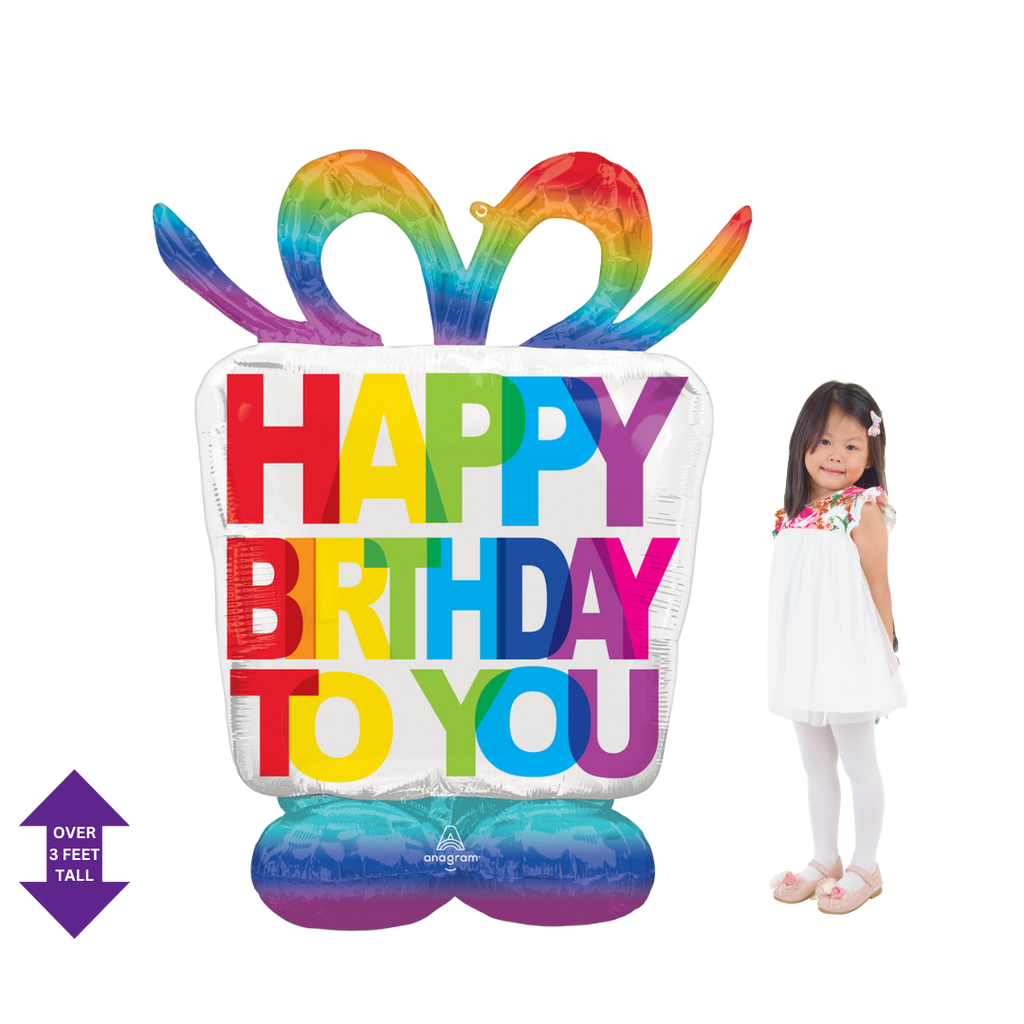 Rainbow giant birthday gift box foil balloon with colorful bow for birthday celebration from Parte Haus party supply store in Bethesda Maryland