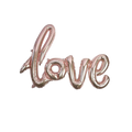 Rose gold love script foil balloon romantic event decor from Parte Haus party supply store in Bethesda MD
