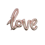 Rose gold love script foil balloon romantic event decor from Parte Haus party supply store in Bethesda MD
