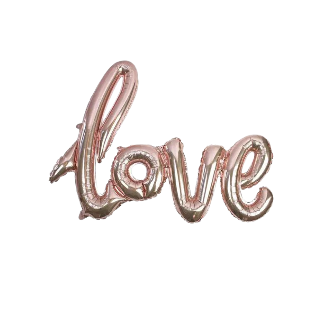 Rose gold love script foil balloon romantic event decor from Parte Haus party supply store in Bethesda MD