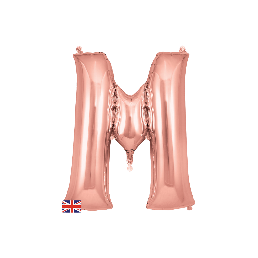 Rose gold 34in letter M foil balloon for birthday, wedding, and anniversary party – from Parte Haus party supply store in Bethesda, Maryland.