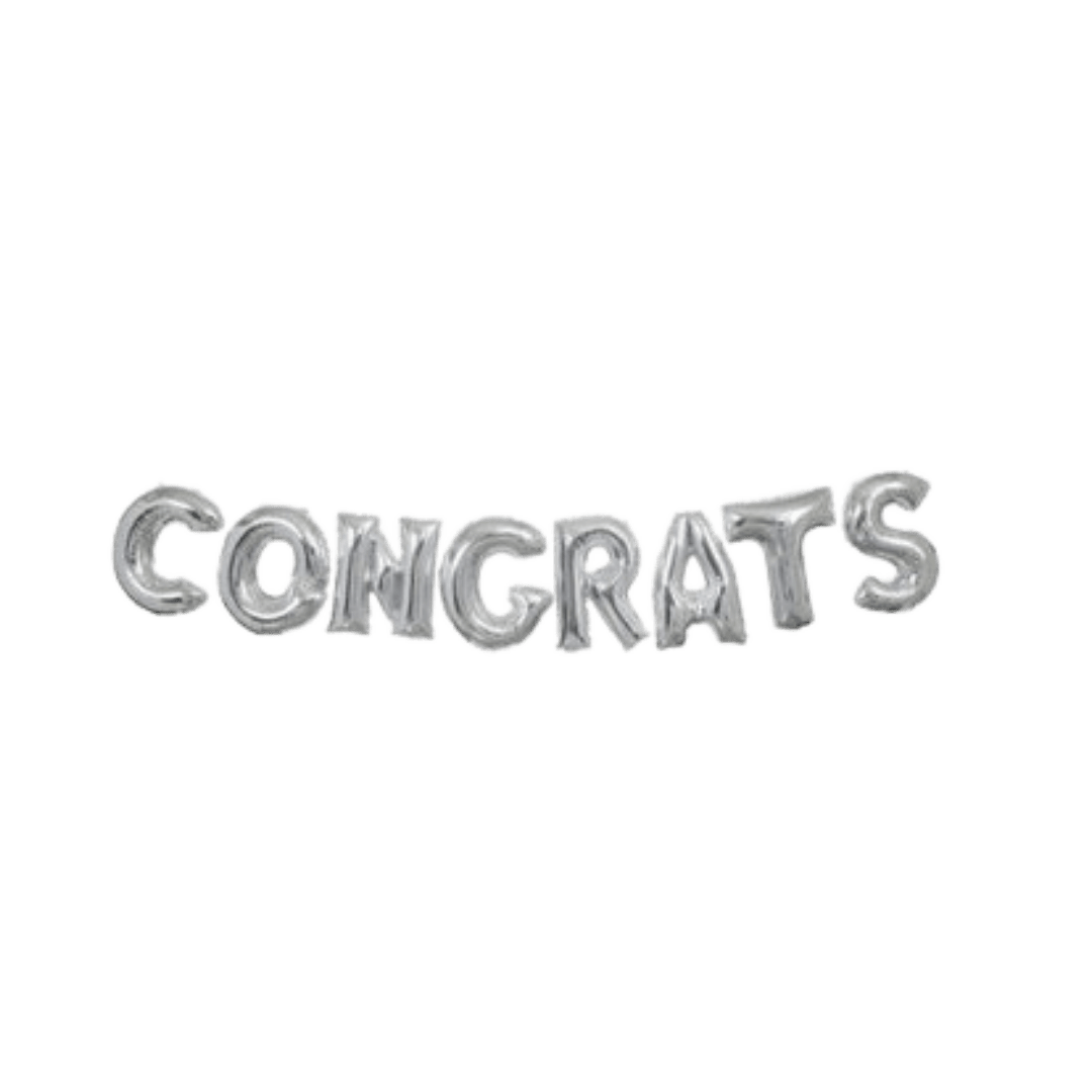 Silver 14in congrats banner foil balloon for celebration parties – from Parte Haus party supply store in Bethesda, Maryland.