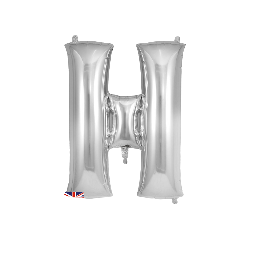 Silver 34in letter H foil balloon for birthday parties – from Parte Haus party supply store in Bethesda, Maryland.