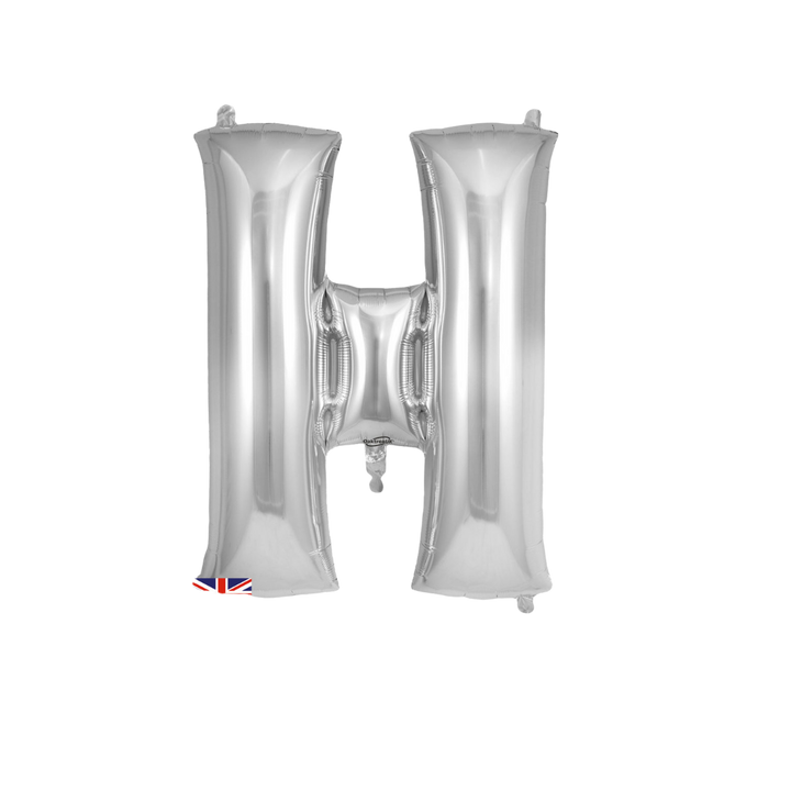 Silver 34in letter H foil balloon for birthday parties – from Parte Haus party supply store in Bethesda, Maryland.