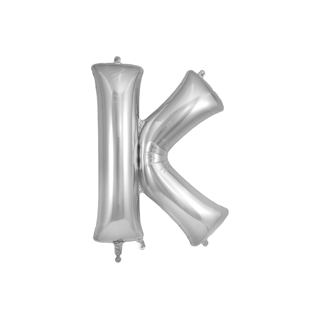 Silver 34in letter K foil balloon for birthday parties – from Parte Haus party supply store in Bethesda, Maryland.