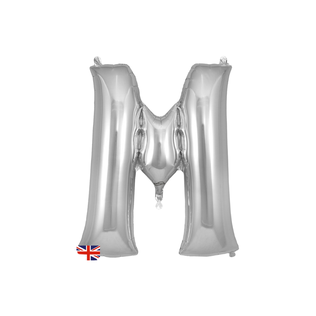 Silver letter M foil balloon with shiny finish birthday decoration from Parte Haus party supply store in Bethesda MD.