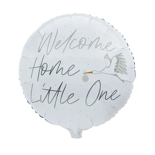 White foil balloon with welcome home little one text and stork baby arrival from Parte Haus party supply store in Bethesda Maryland