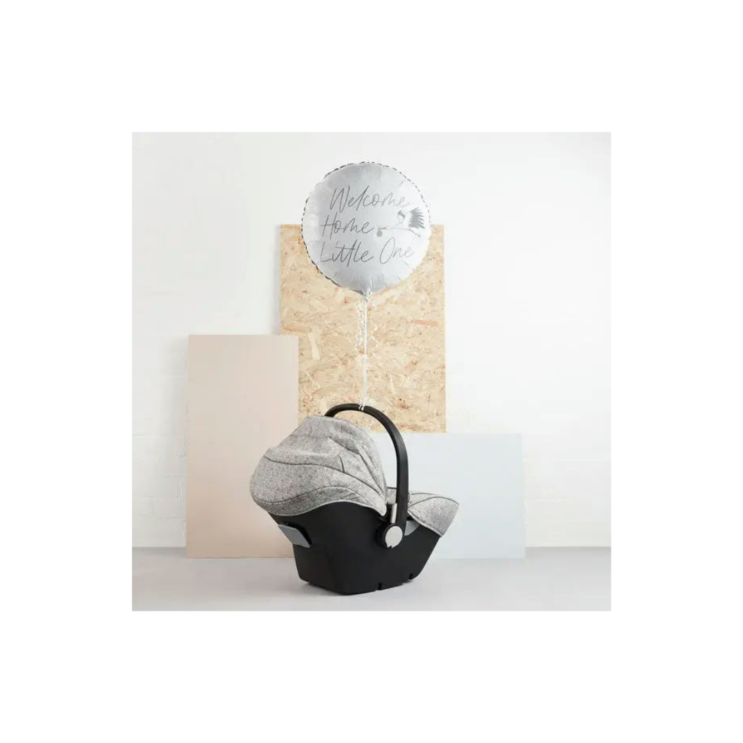 White foil balloon with welcome home little one text for baby arrival from Parte Haus party supply store in Bethesda MD