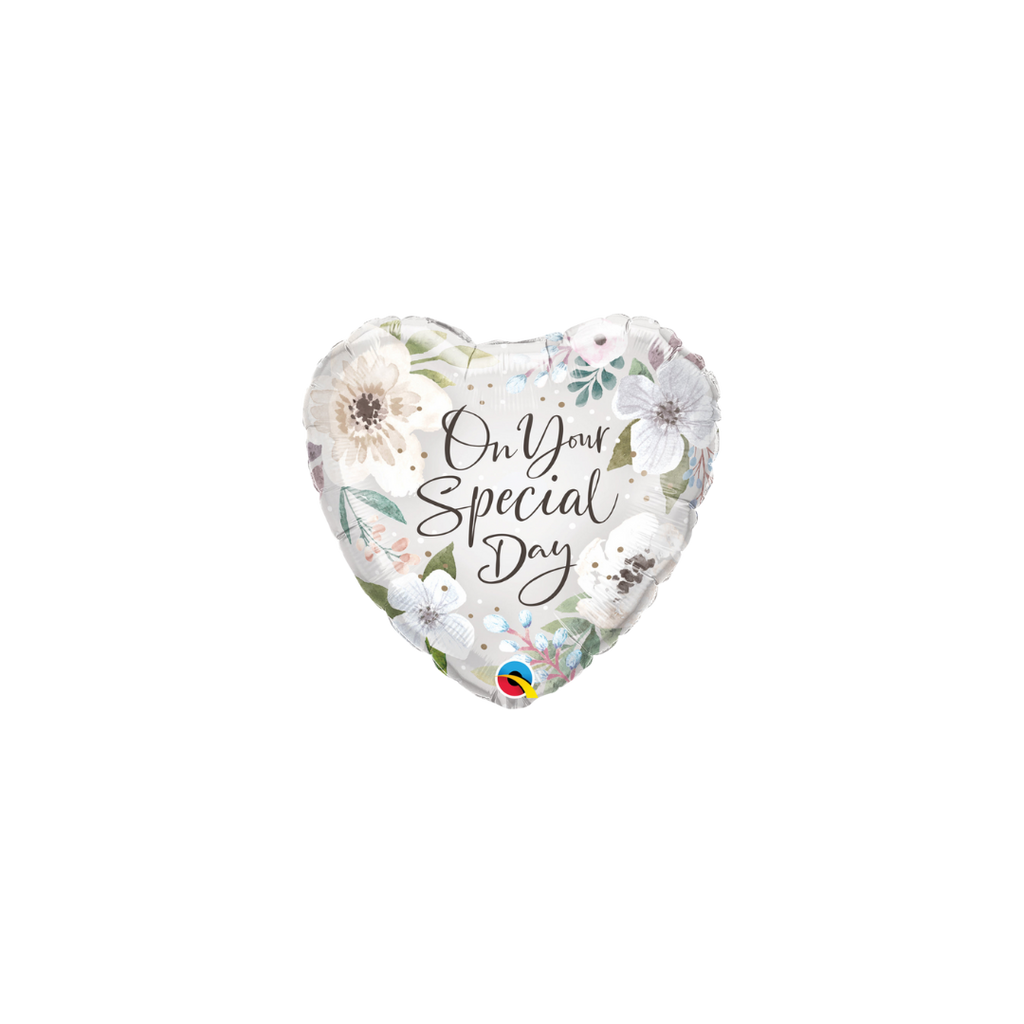 White heart foil balloon with floral design for special day celebration from Parte Haus party supply store in Bethesda Maryland