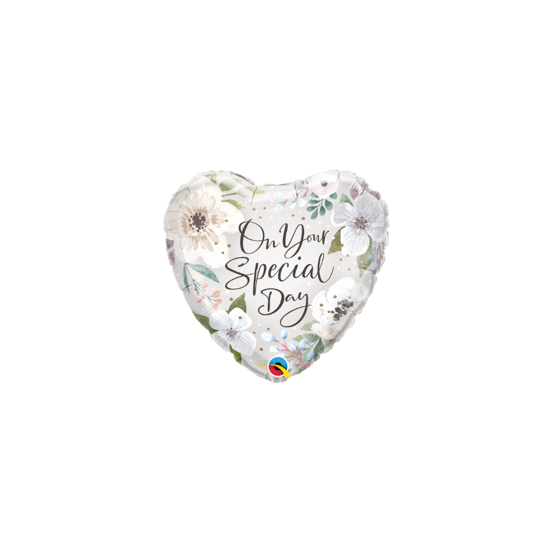 White heart foil balloon with floral design for special day celebration from Parte Haus party supply store in Bethesda Maryland